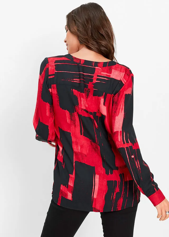 BLUSA LARGA CON ESTAMPADO ROJONEGRO