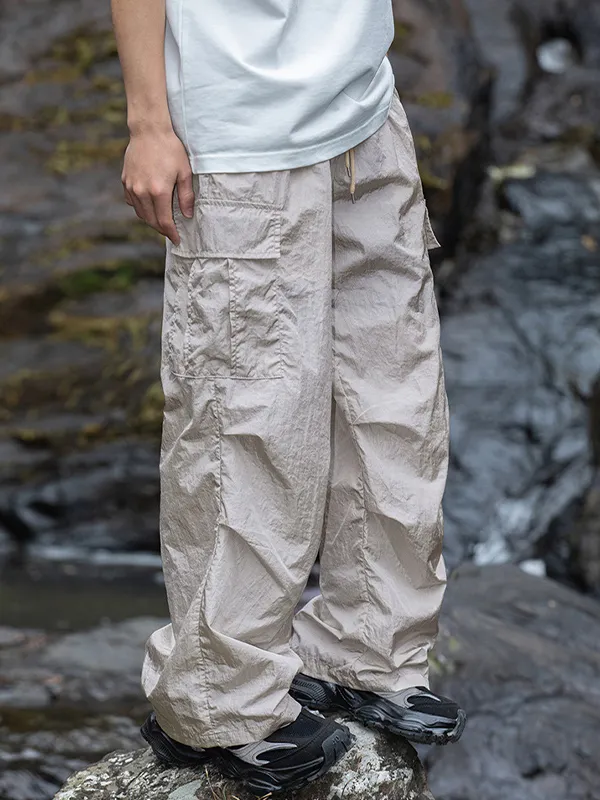 Pantalones cargo plisados dobles con bolsillo grande texturizado para hombre