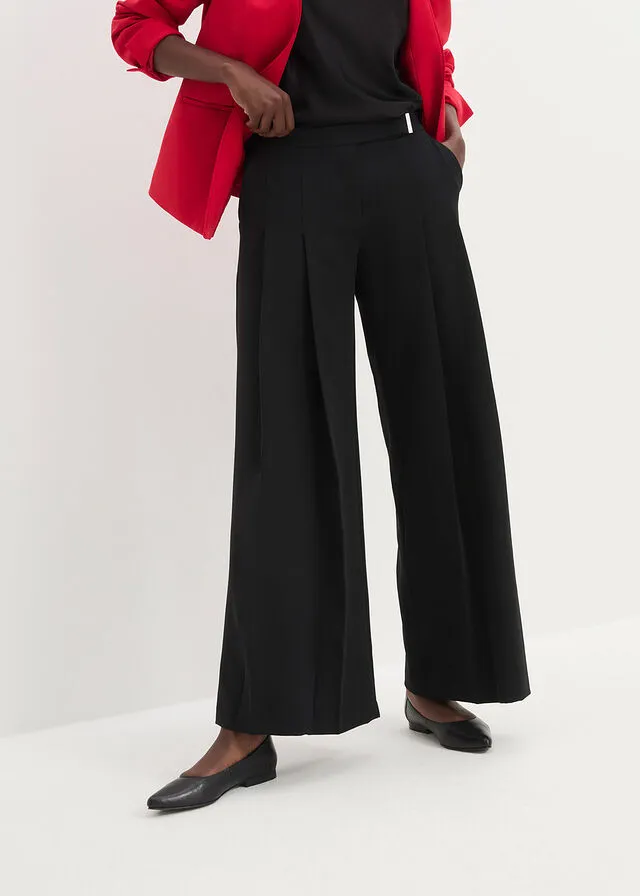 Pantalón ancho con pliegues Negro