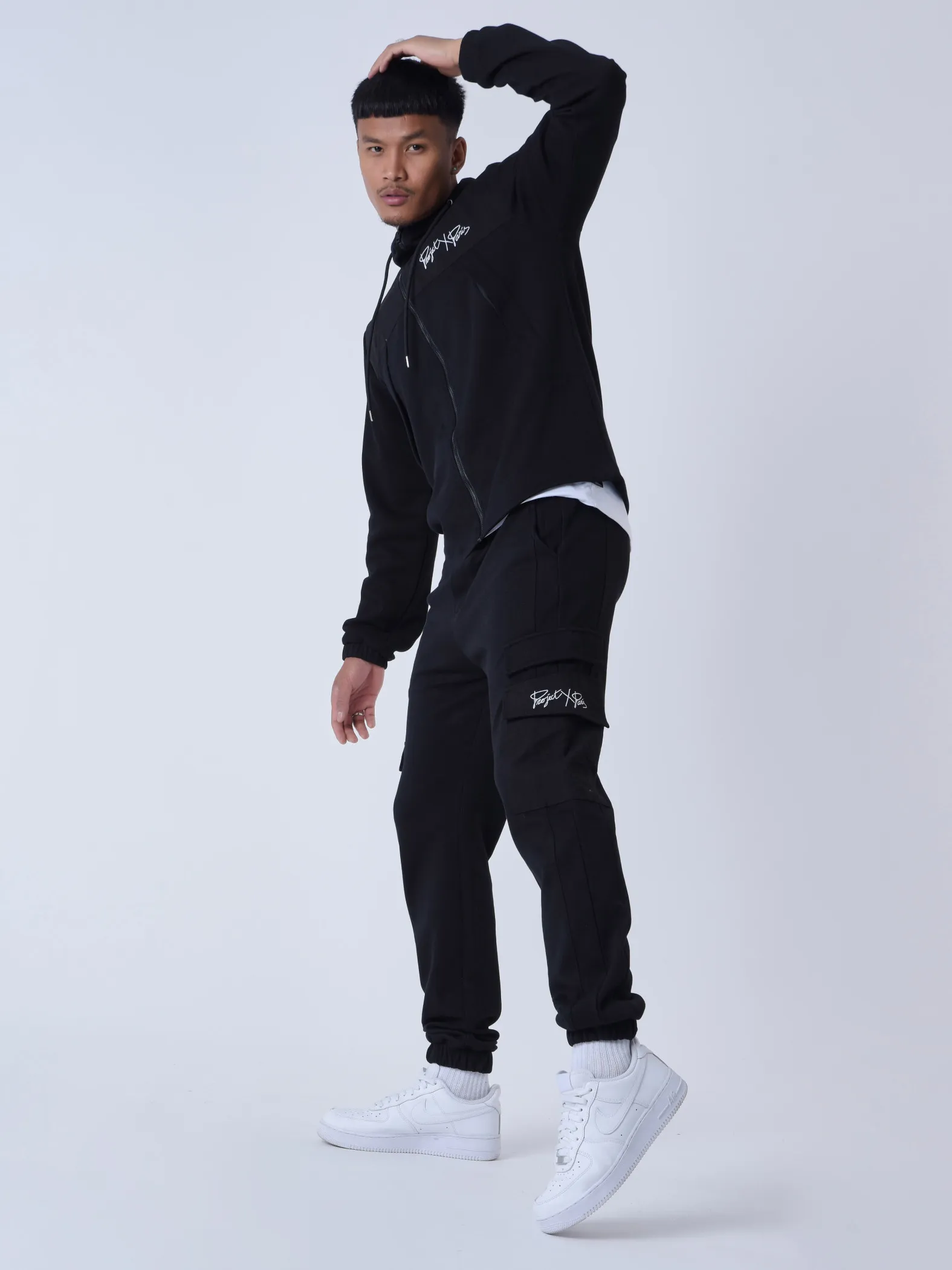 Pantalón de chándal de dos piezas con bolsillos