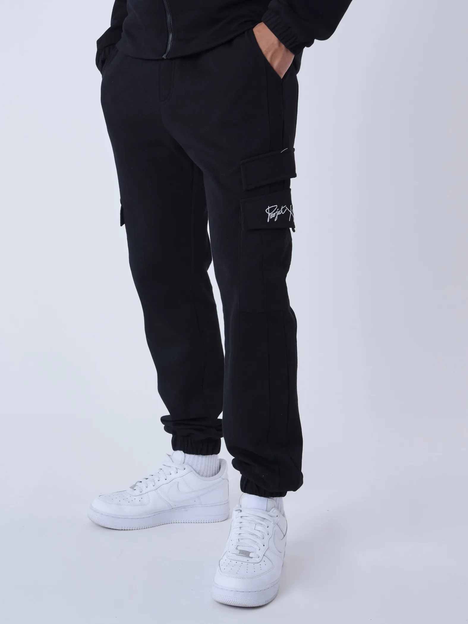 Pantalón de chándal de dos piezas con bolsillos