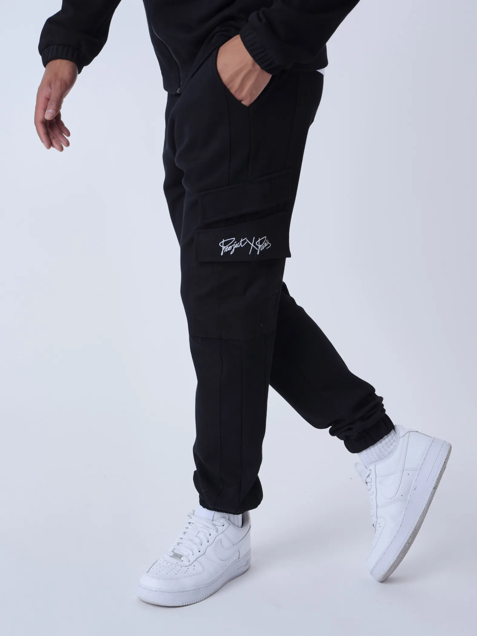 Pantalón de chándal de dos piezas con bolsillos
