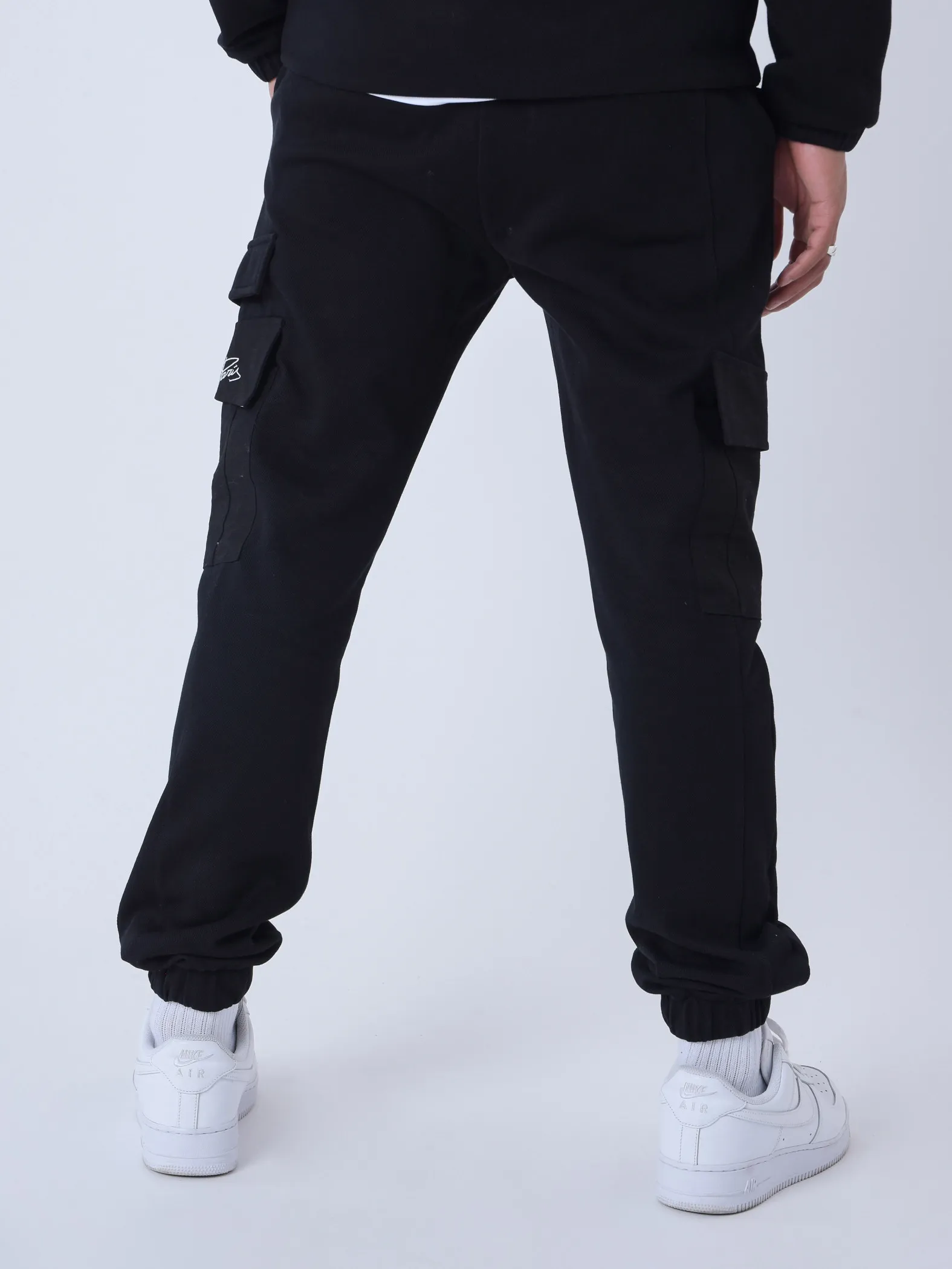 Pantalón de chándal de dos piezas con bolsillos