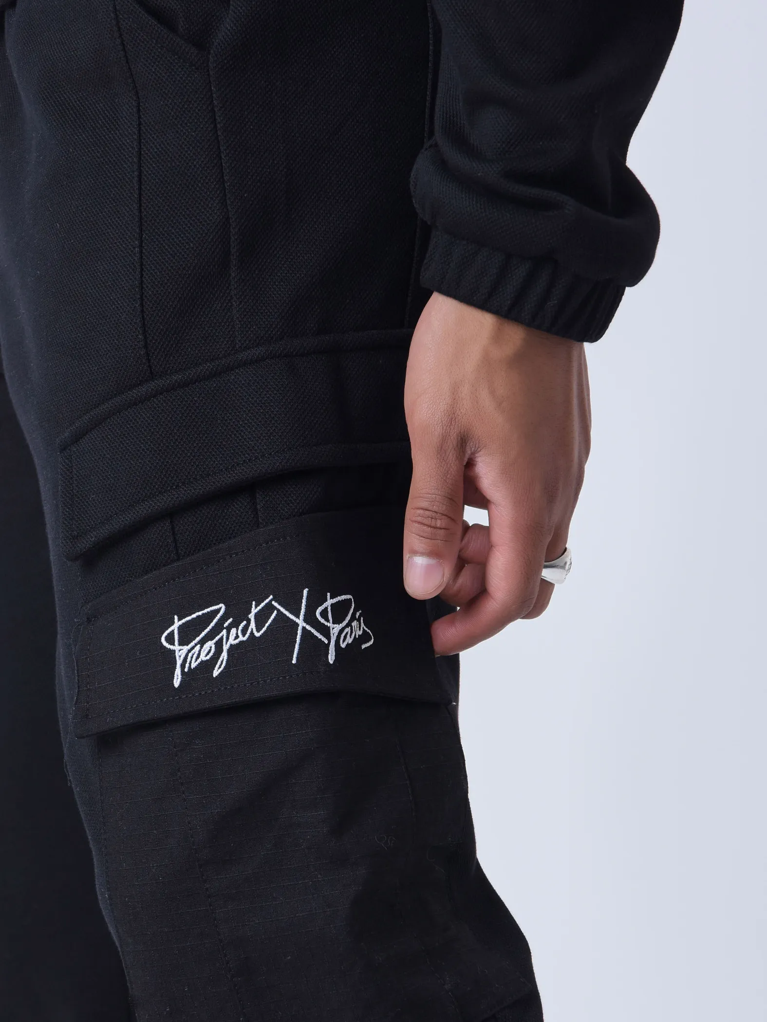 Pantalón de chándal de dos piezas con bolsillos