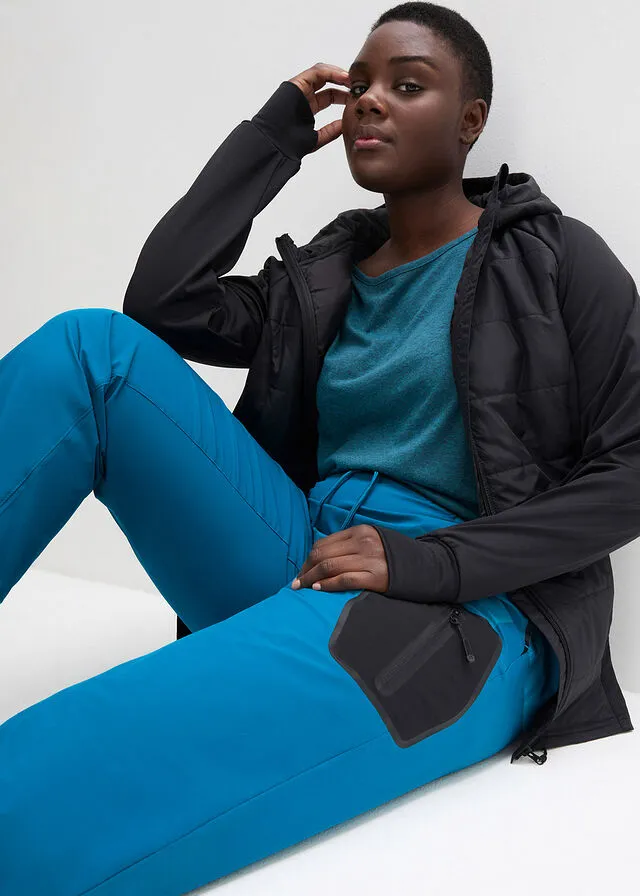 Pantalón elástico en 4 direcciones con material impermeable y bolsillos Negro