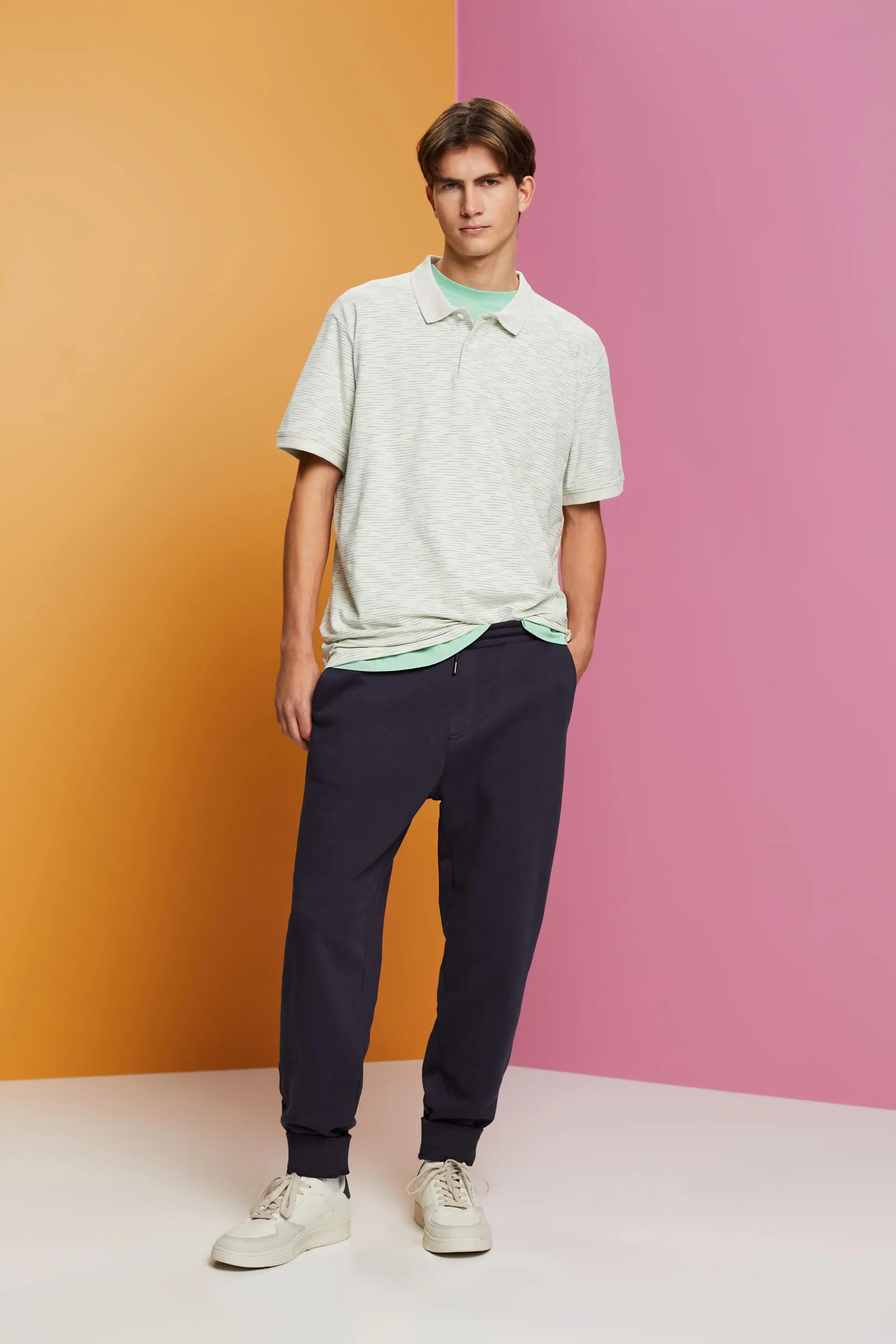Polo jaspeado con rayas finas