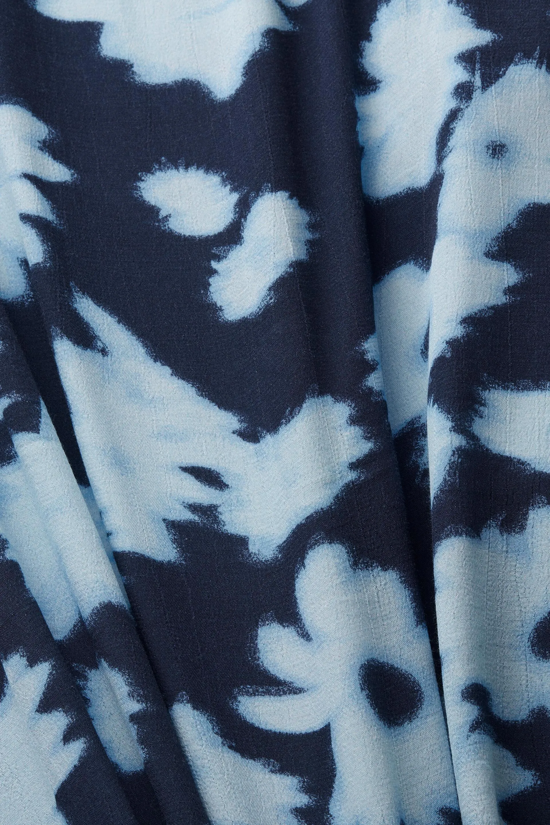 Poncho estampado con diseño abierto