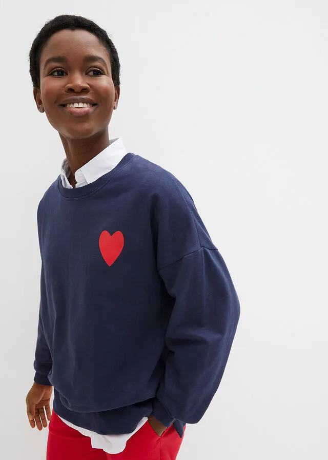 SUDADERA DE ALGODóN ORGáNICO CON CORTE CóMODO Y ABERTURAS LATERALES AZUL MARINOFRESA ESTAMPADO
