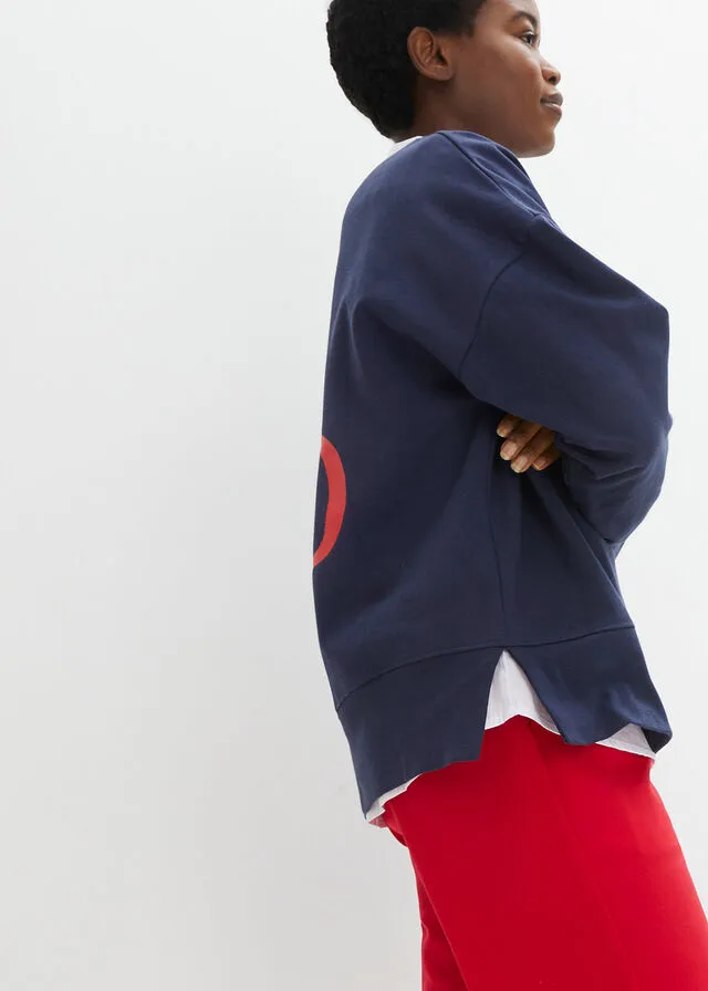 SUDADERA DE ALGODóN ORGáNICO CON CORTE CóMODO Y ABERTURAS LATERALES AZUL MARINOFRESA ESTAMPADO