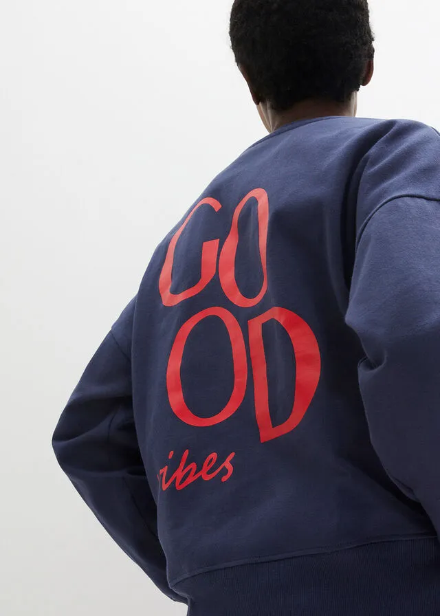 SUDADERA DE ALGODóN ORGáNICO CON CORTE CóMODO Y ABERTURAS LATERALES AZUL MARINOFRESA ESTAMPADO