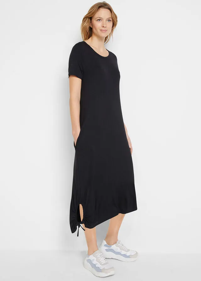 Vestido camisero midi con bolsillos laterales y detalle fruncido Negro