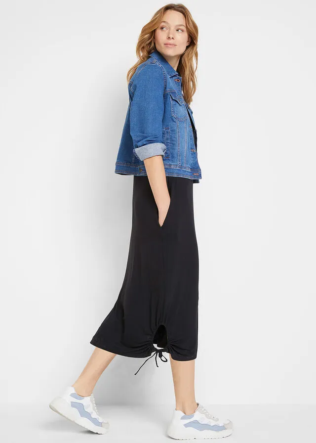 Vestido camisero midi con bolsillos laterales y detalle fruncido Negro